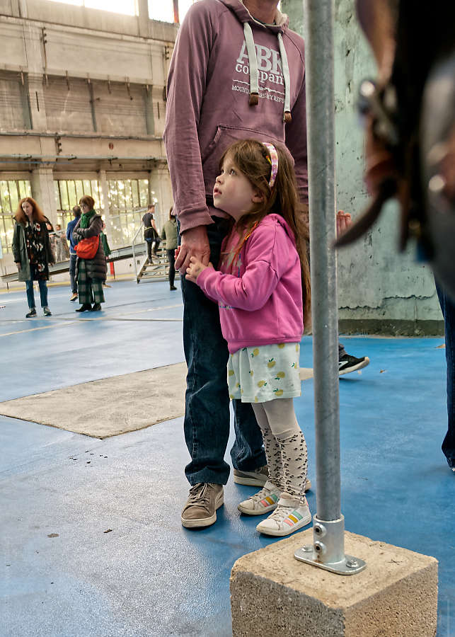 impressed child at the 17th Lyon 2024 art biennial