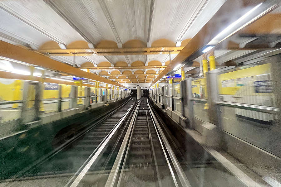 view of the tracks in a station on line 1 of the Paris metro system