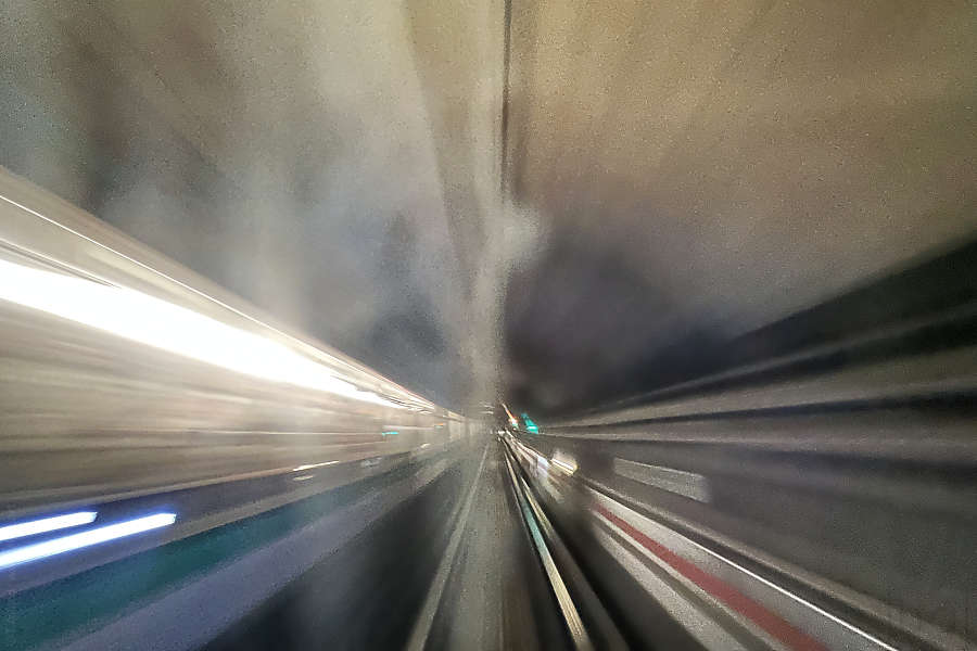 blurred tunnel interior photo of the Paris metro